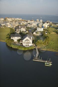 Royalty Free Photo of an Aerial View of Houses and Ocean at Bald Head Island, North Carolina