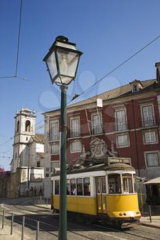 Royalty Free Photo of a Street Scene With Trolley in Lisbon, Portugal