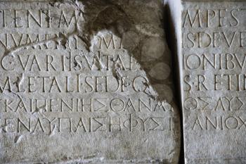 Royalty Free Photo of a Script Carved in Stone in Capitoline Museum, Rome, Italy
