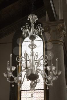 Royalty Free Photo of a Decorative Crystal Chandelier Hanging From Ceiling