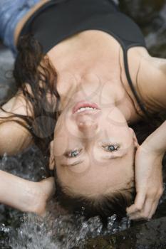 Royalty Free Photo of a Woman Laying in Water