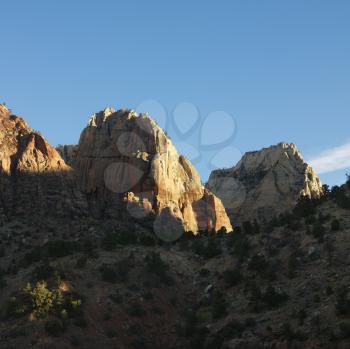Royalty Free Photo of Rocky Cliffs and Rock Formations in Desert of Zion National Park, Utah