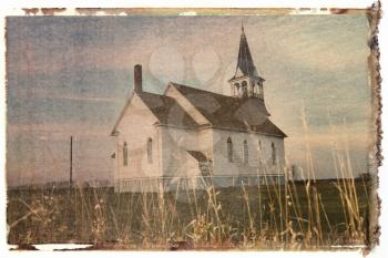 Royalty Free Photo of a Polaroid Transfer of a Small Rural Church in a Field