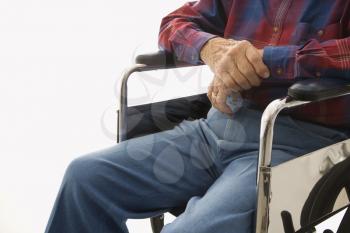 Royalty Free Photo of a Torso Shot of an Elderly Man Sitting in a Wheelchair