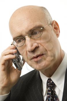 Royalty Free Photo of a Caucasian Businessman Talking on a Cellphone 