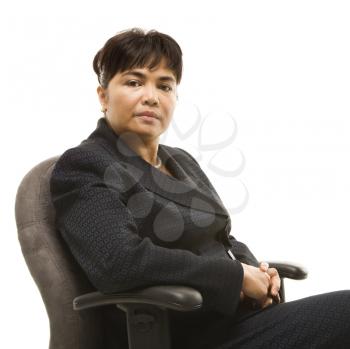 Royalty Free Photo of a Businesswoman Sitting in a Office Chair