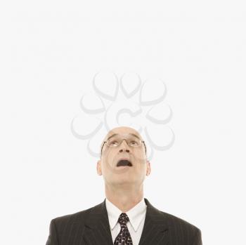 Royalty Free Photo of a Businessman Looking up With Mouth Open 