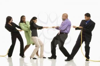 Royalty Free Photo of Multi-Ethnic Businessmen Playing Tug of War Against a Businesswomen