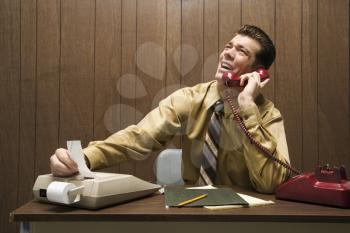 Royalty Free Photo of
a Businessman Talking on a Telephone