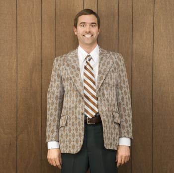 Royalty Free Photo of a Smiling Male in a Retro Suit
