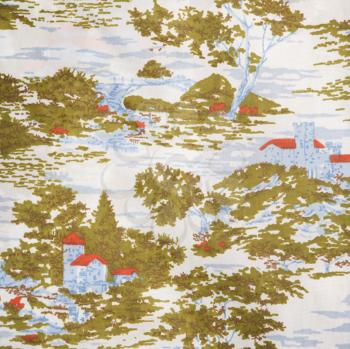 Royalty Free Photo of a Close-up of a Vintage Fabric With a Village and Trees Printed on Polyester