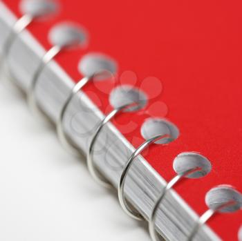 Royalty Free Photo of a Close-Up a Red Spiral Bound Notebook