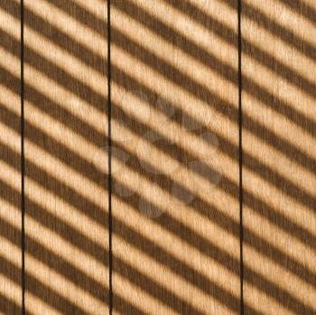 Royalty Free Photo of Sunlight Reflecting Diagonal Stripes Onto Wood Paneling