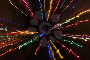 Royalty Free Photo of Multicolored Lights Forming a Radial Starburst Pattern From Motion Blur