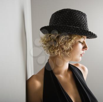 Royalty Free Photo of a Woman Wearing a Fedora