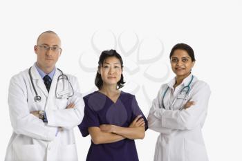 Royalty Free Photo of a Physician Standing With Doctors