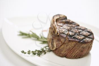 Royalty Free Photo of a Grilled Beef Tenderloin on a Plate