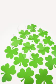 Royalty Free Photo of a Group of green paper shamrocks 