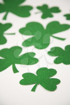 Royalty Free Photo of a Group of Green Paper Shamrocks