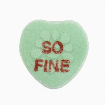 Royalty Free Photo of a Green Candy Heart That Reads So Fine 