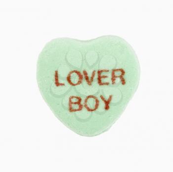 Royalty Free Photo of a Green Candy Heart That Reads Lover Boy
