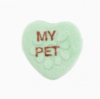Royalty Free Photo of a Green Candy Heart That Reads My Pet