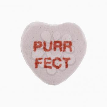 Royalty Free Photo of a Candy Heart That Reads Purrfect