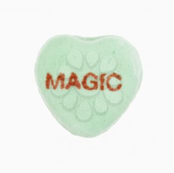 Royalty Free Photo of a Candy Heart That Reads Magic