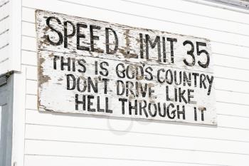 Royalty Free Photo of a Funny Small Town Speed Limit Sign