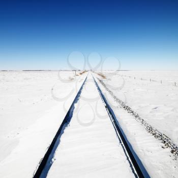 Royalty Free Photo of Snow Covered Railroad Tracks 