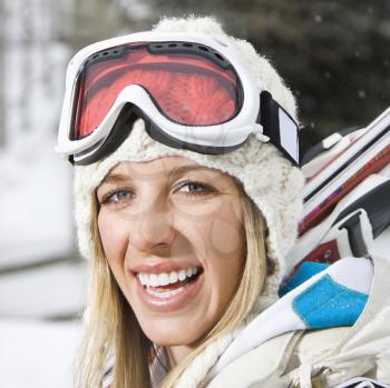 Royalty Free Photo of a Blond Woman in Winter Ski Gear Smiling