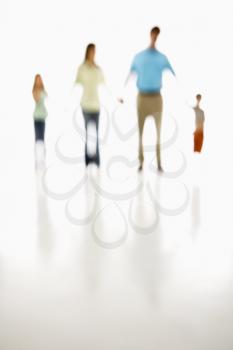 Royalty Free Photo of a Soft Focus Family Holding Hands