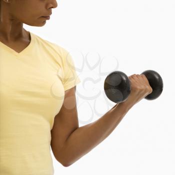 Royalty Free Photo of a Woman Doing Bicep Curls