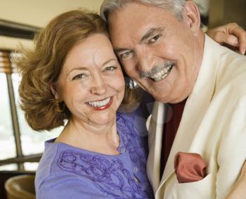 Royalty Free Photo of a Smiling Couple Embracing