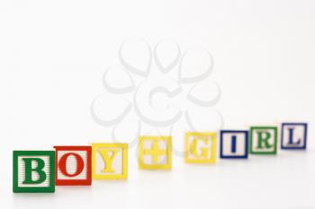Royalty Free Photo of Alphabet Building Blocks Spelling Boy and Girl