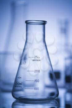 Royalty Free Photo of a Glass Erlenmeyer Flask With a Blue Tint