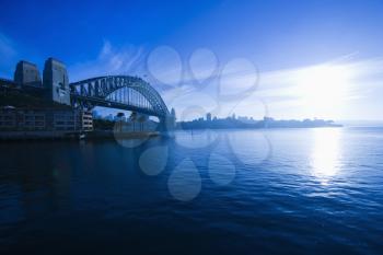 Royalty Free Photo of a View of the Sydney Harbour With the Sydney Harbour Bridge and Distant Skyline 