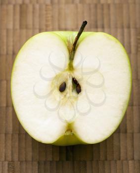 Royalty Free Photo of a Close-up of a Sliced Green Apple