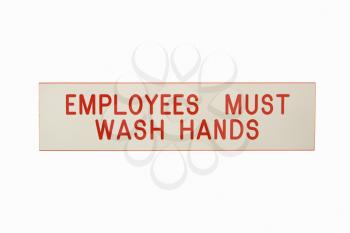 Royalty Free Photo of an Employees Must Wash Hands Sign