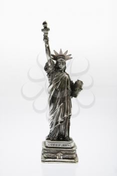 Statue of Liberty reproduction on white background.