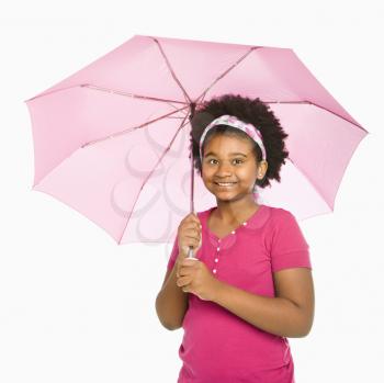 Royalty Free Photo of a Smiling Girl Holding a Pink Umbrella