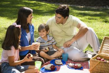 Royalty Free Photo of a Family Picnic in the Park