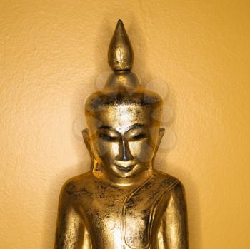 Royalty Free Photo of a Golden Wooden Buddha Statue