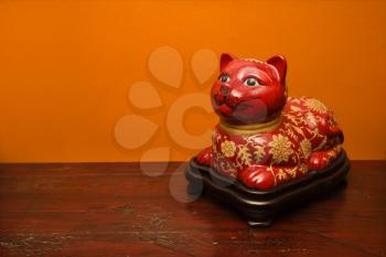 Royalty Free Photo of a Chinese Red Cat Statue