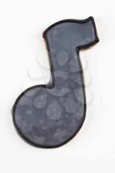Sugar cookie in the shape of a music note.