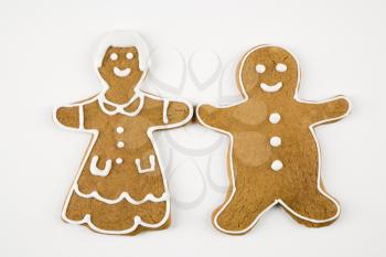 Royalty Free Photo of Male and Female Gingerbread Cookies Holding Hands