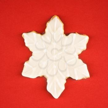 Royalty Free Photo of a Snowflake Sugar Cookie With Decorative Icing
