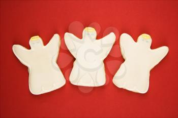Royalty Free Photo of Three Angel Sugar Cookies With Decorative Icing