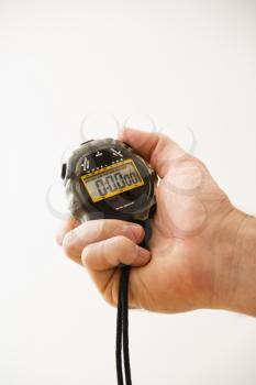 Royalty Free Photo of a Close-up of a Man's Hand Holding a Stopwatch