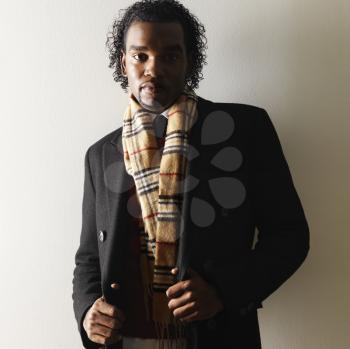 Royalty Free Photo of a Man in Dress Attire and s Scarf